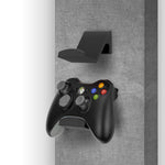 CINTRE MURAL UNIVERSEL POUR MANETTE DE JEU (UGC1) POUR XBOX, PLAYSTATION, PC ET PLUS - PAQUET DE 2 - NOIR